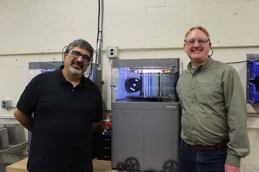 Alan Bolind and Amin Jazaeri in front of a 3D printer
