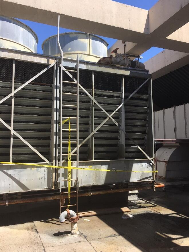 Broken Ladder surrounded by caution tape